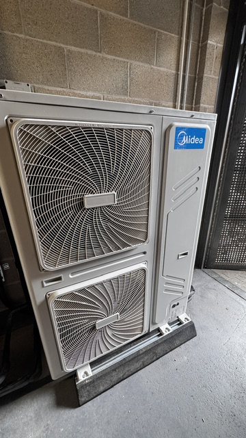 Commercial air conditioning outdoor unit in a plant area